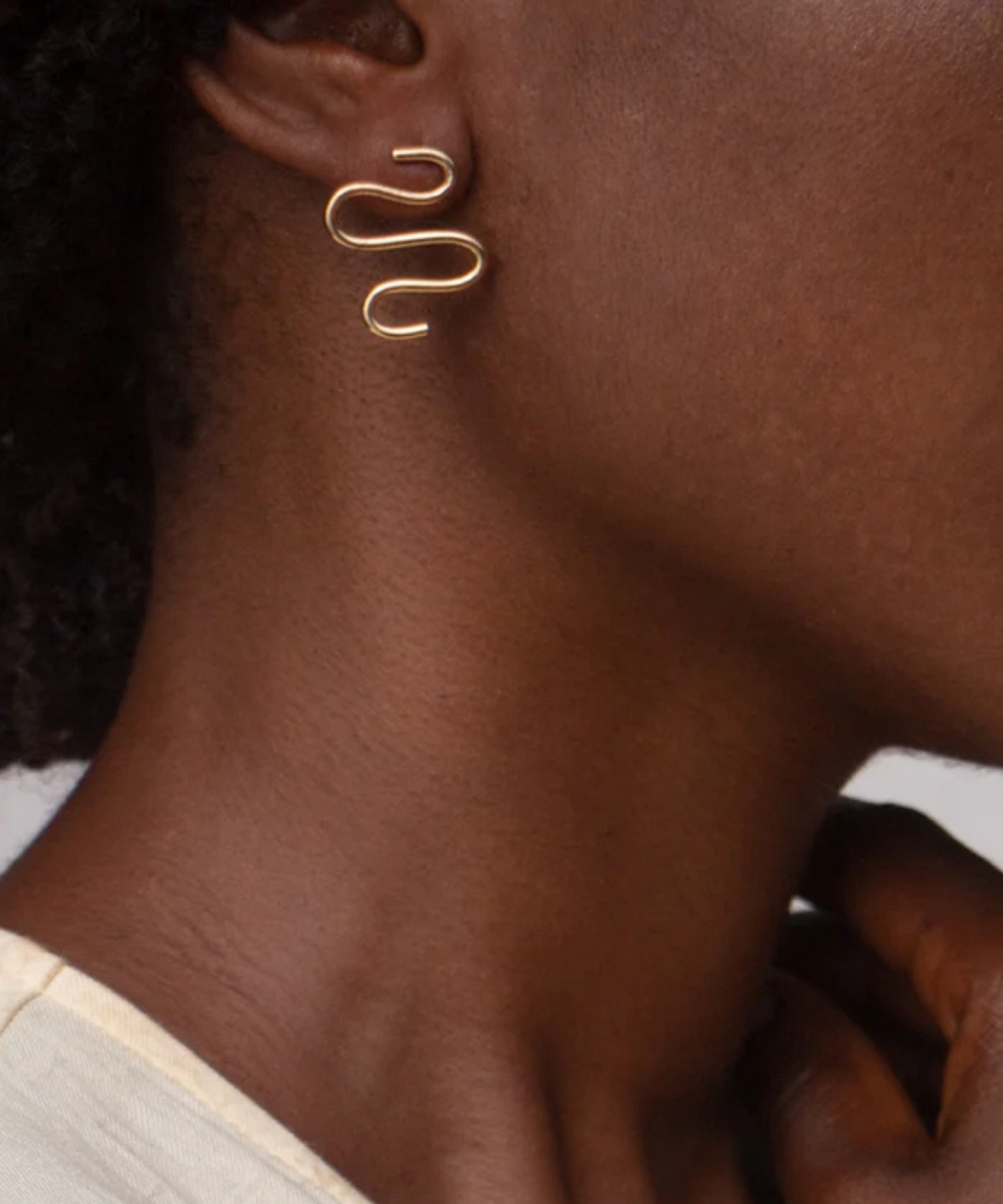 Handmade gold-plated earrings made from recycled materials