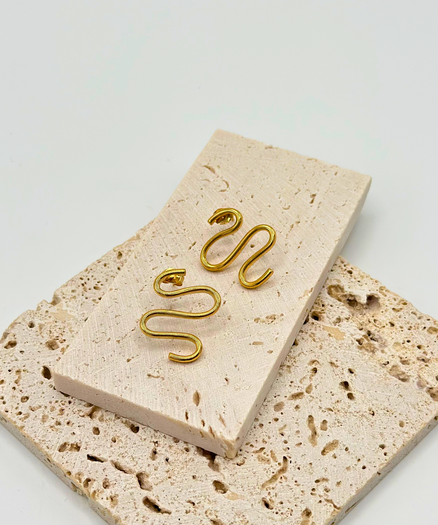 Handmade gold-plated earrings made from recycled materials